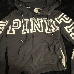 Black and white zip up.